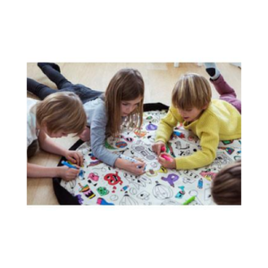 Children playing with toys on a mat