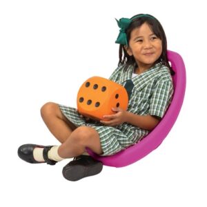 child sitting in a rocker chair
